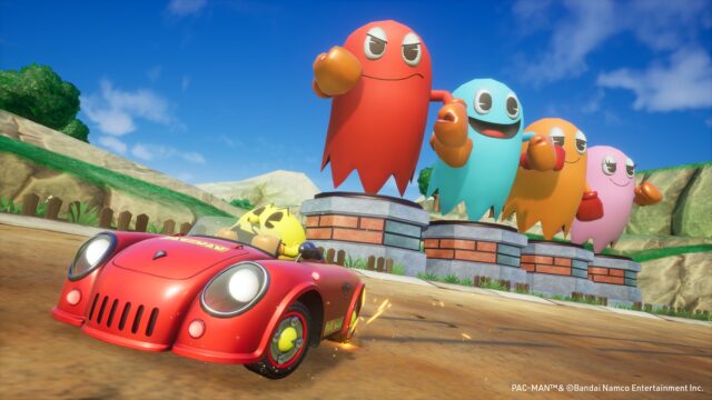A promotional screenshot from Sonic Racing: CrossWorlds showing PAC-MAN and the ghosts.